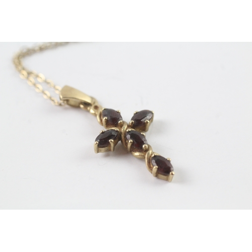 246 - 9ct gold garnet cross pendant on chain