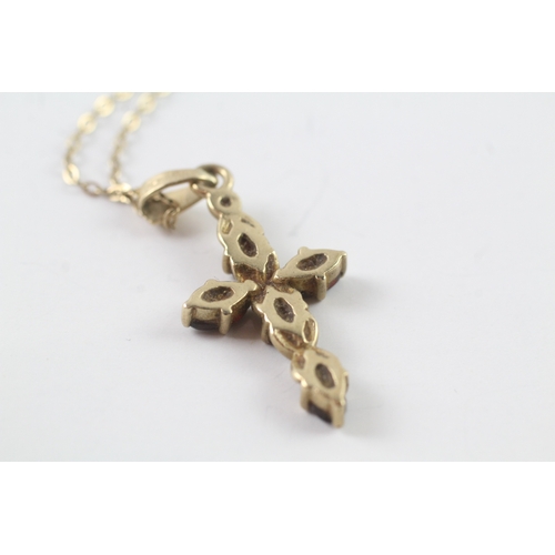 246 - 9ct gold garnet cross pendant on chain