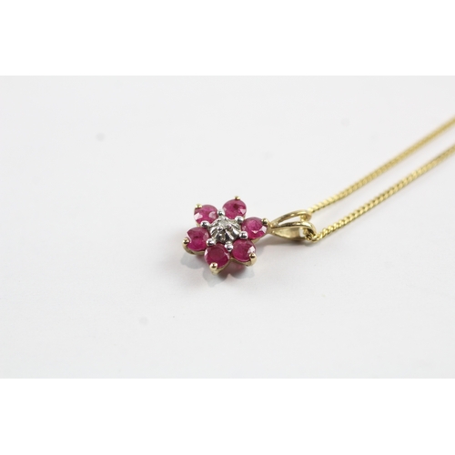 4 - 9ct gold ruby and diamond flower pendant on chain