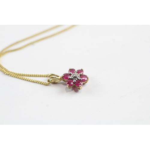 4 - 9ct gold ruby and diamond flower pendant on chain