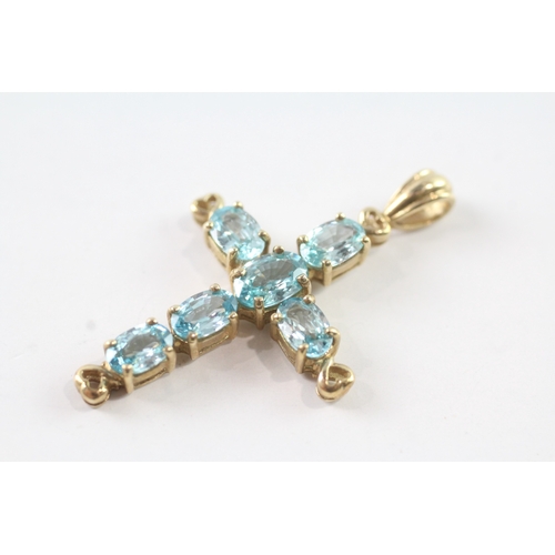 48 - 9ct gold topaz set cross pendant