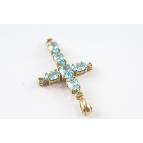 48 - 9ct gold topaz set cross pendant