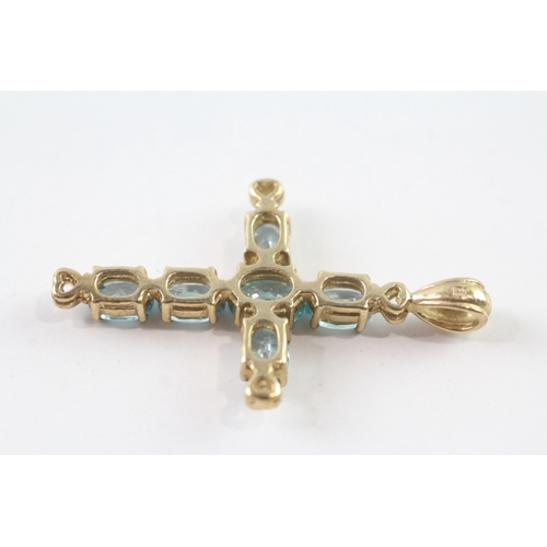 48 - 9ct gold topaz set cross pendant