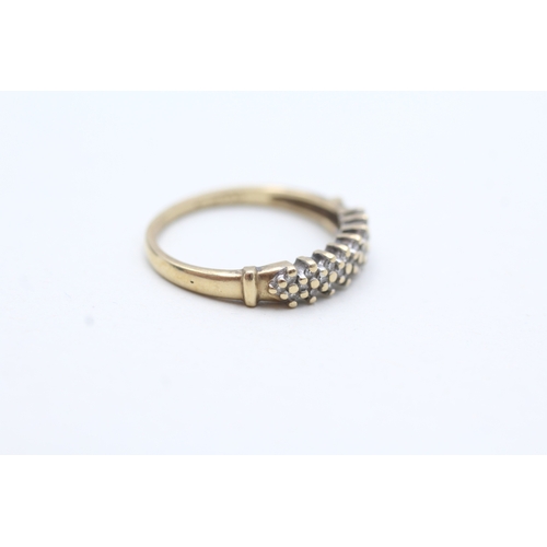 65 - 9ct gold diamond eternity ring (1.7g) Size M