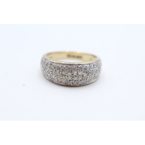 66 - 9ct gold parve set diamond dress ring (3.2g) Size L