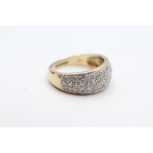 66 - 9ct gold parve set diamond dress ring (3.2g) Size L