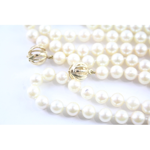 75 - 9ct gold double clasped beaded pearl necklace (54.7g)