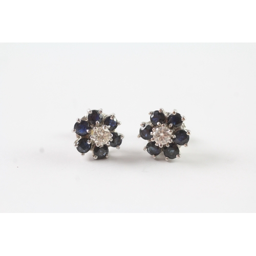 76 - 18ct gold sapphire and diamond floral cluster stud earrings