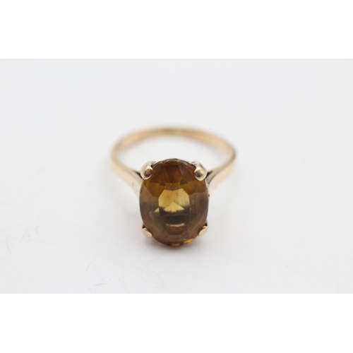 79 - 9ct gold oval cut citrine dress ring (4.3g) Size O 1/2