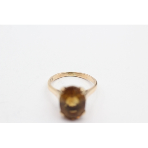 79 - 9ct gold oval cut citrine dress ring (4.3g) Size O 1/2