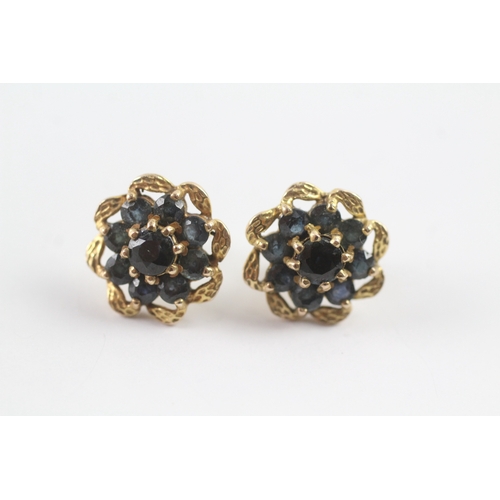 82 - 9ct gold sapphire floral cluster stud earrings