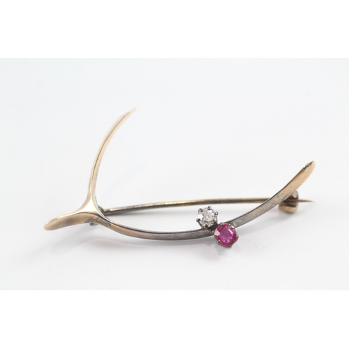 83 - 9ct gold vintage diamond and pink gemstone wishbone brooch