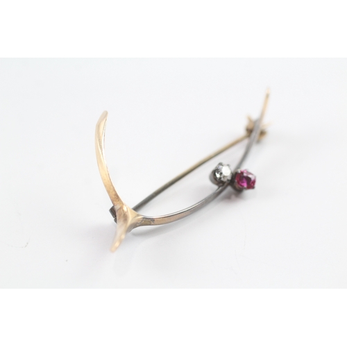 83 - 9ct gold vintage diamond and pink gemstone wishbone brooch