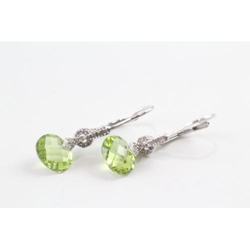 92 - 9ct white gold peridot and diamond drop earrings w/ hinged backs