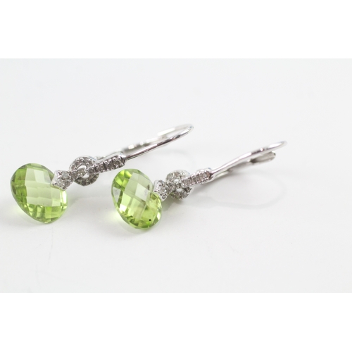 92 - 9ct white gold peridot and diamond drop earrings w/ hinged backs