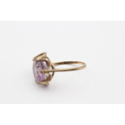 94 - 9ct gold oval cut amethyst dress ring (3g) Size O