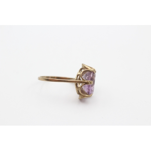 94 - 9ct gold oval cut amethyst dress ring (3g) Size O