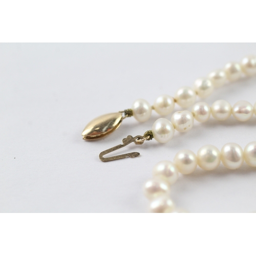 105 - 9ct gold cultured pearl necklace (15.9g)