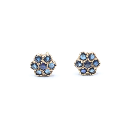 109 - 9ct gold blue gemstone flower stud earrings (1.4g)