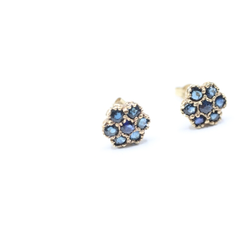 109 - 9ct gold blue gemstone flower stud earrings (1.4g)