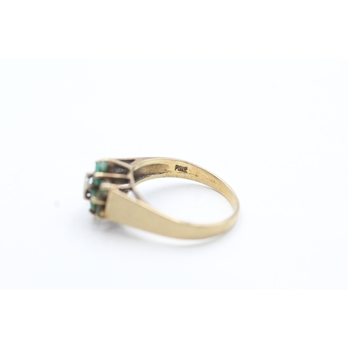 125 - 9ct gold emerald and diamond halo ring (2.8g) Size O