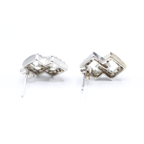 130 - 9ct gold and diamond stud earrings (2.9g)