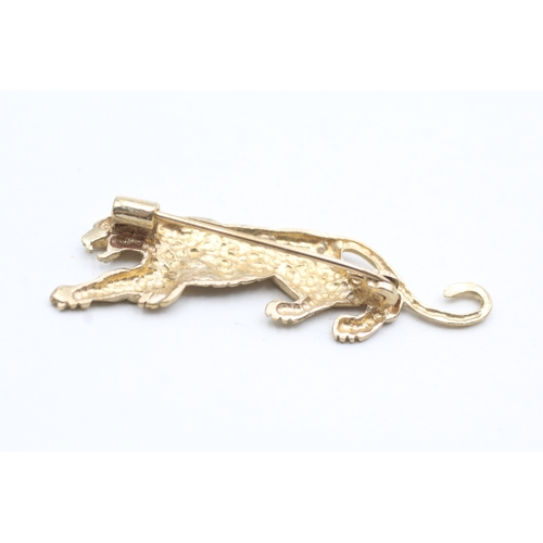 132 - 9ct gold red gemstone panther brooch (3.4g)