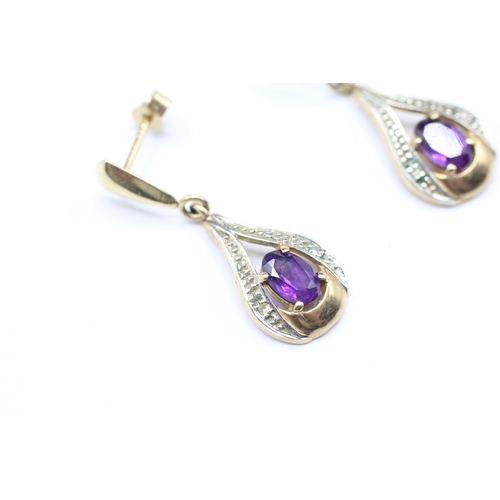 134 - 9ct gold amethyst and diamond drop stud earrings (1.9g)