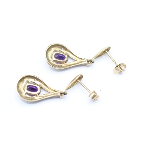 134 - 9ct gold amethyst and diamond drop stud earrings (1.9g)