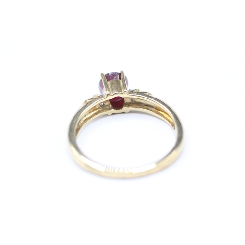 136 - 9ct gold pink gemstone and diamond ring (2.9g) Size J