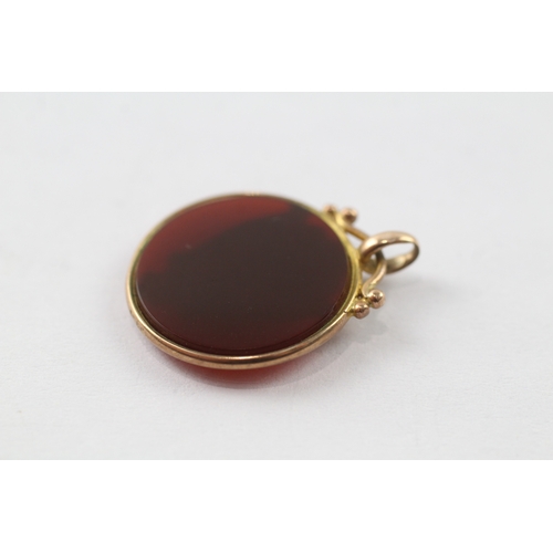 143 - 9 gold vintage red gemstone shield charm