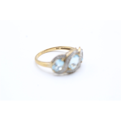 146 - 9ct gold blue gemstone and diamond ring (2.6g) Size P 1/2