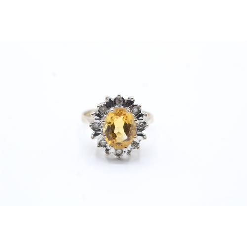 149 - 9ct gold citrine and diamond ring (3.7g) Size L