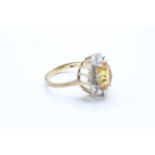 149 - 9ct gold citrine and diamond ring (3.7g) Size L