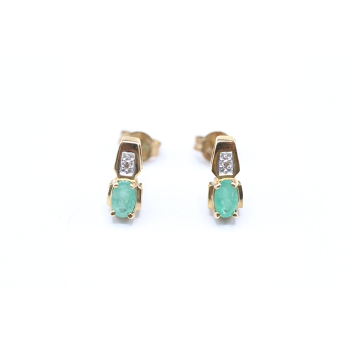 152 - 9ct gold green gemstone and diamond stud earrings (1.1g)