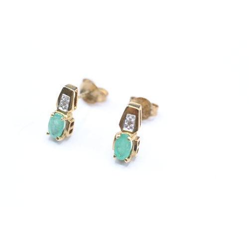 152 - 9ct gold green gemstone and diamond stud earrings (1.1g)