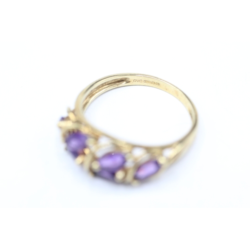 157 - 9ct gold six stone amethyst ring (2.5g) Size Q