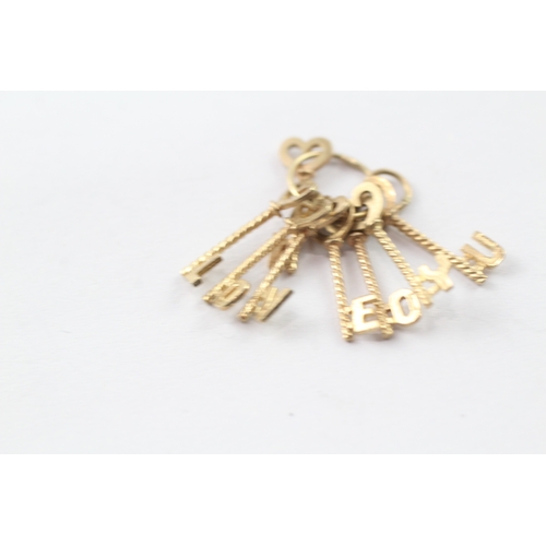 160 - 9ct gold 'I love you' key charm (2.4g)