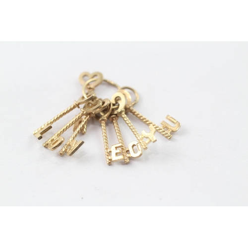 160 - 9ct gold 'I love you' key charm (2.4g)