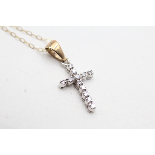 179 - 9ct gold diamond cross pendant necklace (1.3g)