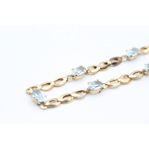 180 - 9ct gold and blue gemstone bracelet (2.5g)