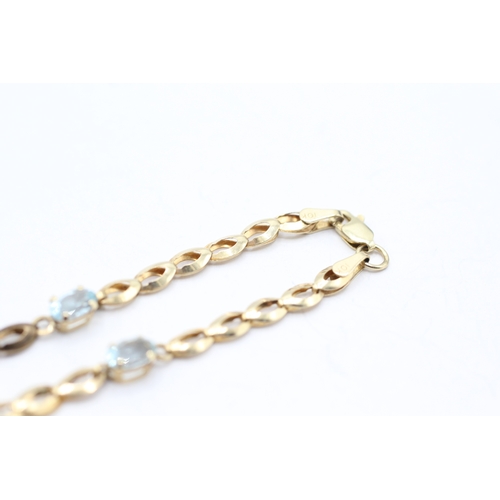 180 - 9ct gold and blue gemstone bracelet (2.5g)