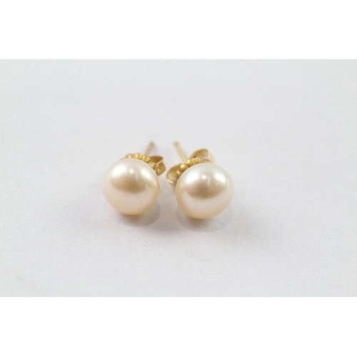 203 - 2x 9ct gold vari-hue cultured pearl stud earrings