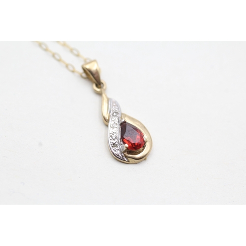 212 - 9ct gold garnet & diamond pendant necklace (1.3g)