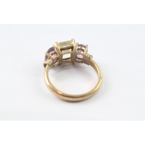 215 - 9ct gold amethyst and yellow gemstone trilogy ring (4.4g) Size P 1/2