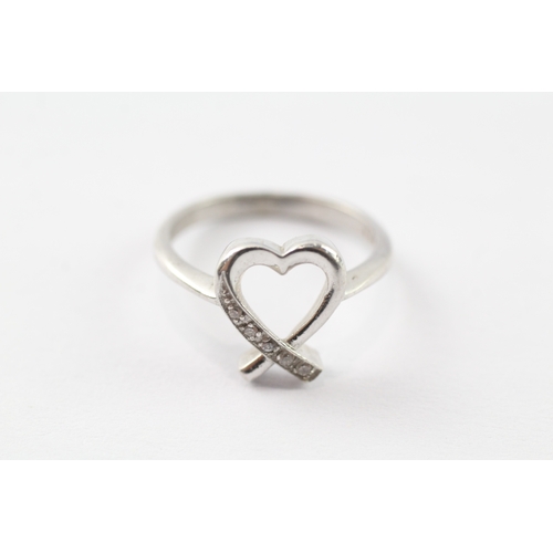 216 - 9ct white gold diamond heart ring (2.9g) Size N 1/2