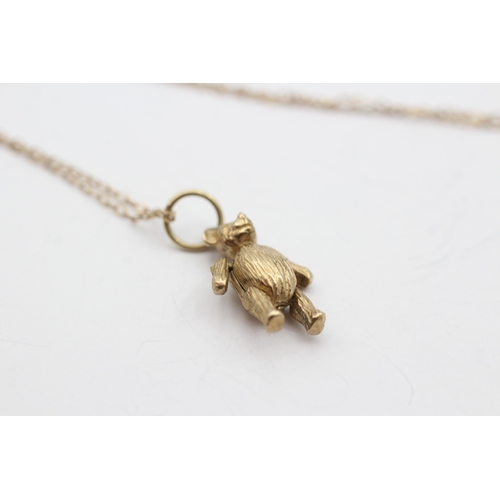 226 - 9ct gold vintage articulated bear pendant necklace (3g)