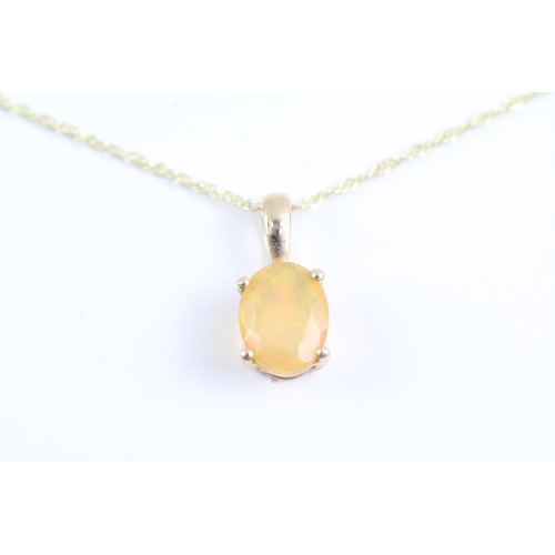 23 - 9ct gold oval cut opal pendant necklace (2.1g)