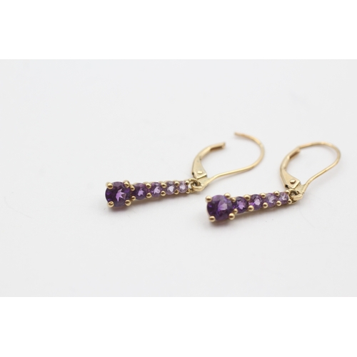 235 - 9ct gold graduated amethyst drop earrings (1.6g)