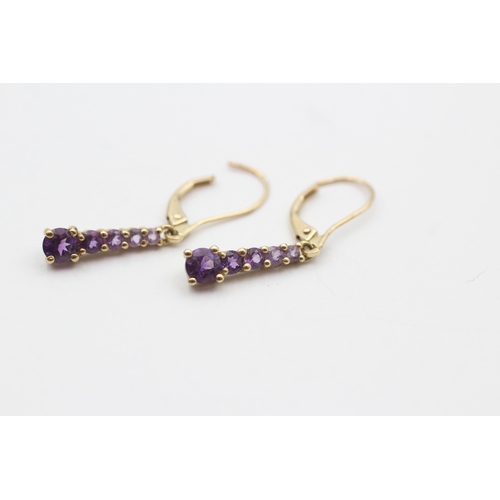 235 - 9ct gold graduated amethyst drop earrings (1.6g)